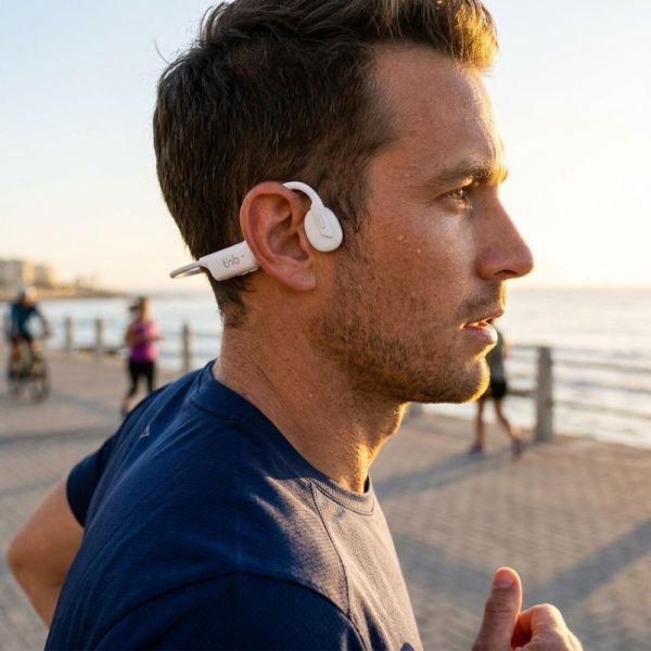 Man wearing T'nB Energy Bone headphones while running